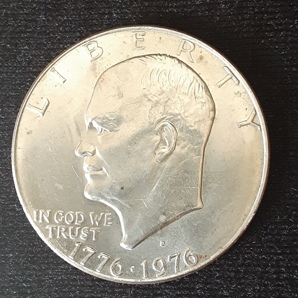 Liberty Bell/ Moon Bicentennial Dollar coin.